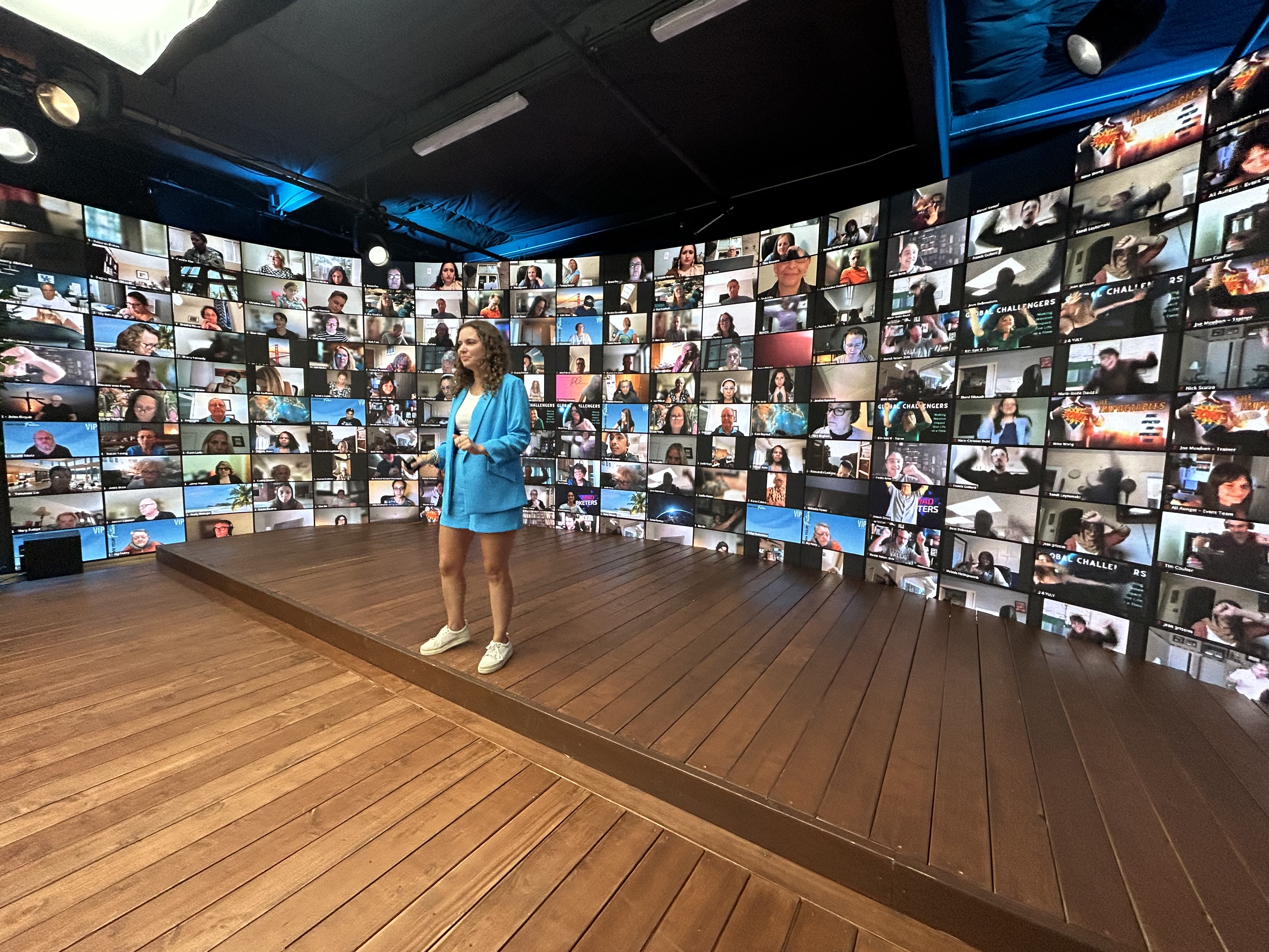 Person holding smartphone, symbolizing building virtual events directly from your phone